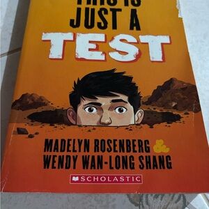 Scholastic Bright Orange Cover with Illustrated Boy Peeking